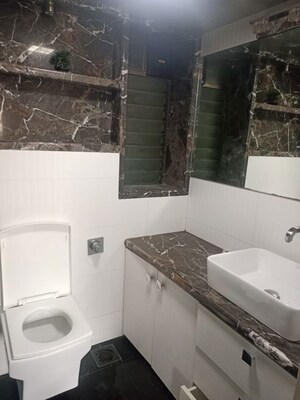 Bathroom in 2 BHK Apartment at Sangam CHS, Goregaon East – for Rent