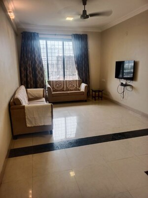 Living Room in 2 BHK Apartment at Sangam CHS, Goregaon East – for Rent