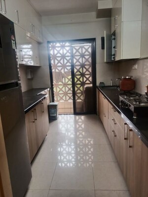 Kitchen in 2 BHK Apartment at Sangam CHS, Goregaon East – for Rent