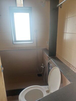 Bathroom in 2 BHK Apartment at Sangam CHS, Goregaon East – for Rent