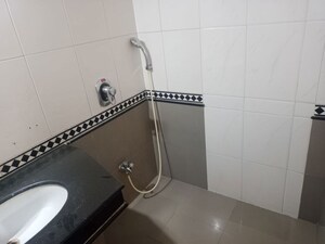 Bathroom in 2 BHK Apartment at Sangam CHS, Goregaon East – for Rent
