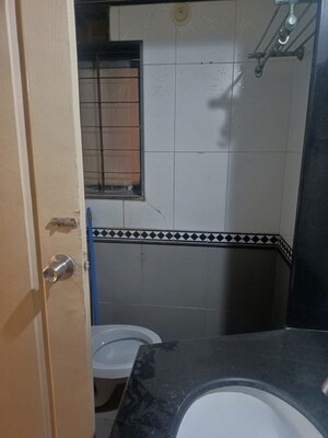 Bathroom in 2 BHK Apartment at Sangam CHS, Goregaon East – for Rent