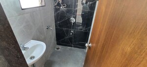Bathroom in 1 BHK Apartment at RNA NG Valencia, Mira Road – for Sale
