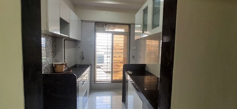 Kitchen, rna-ng-valencia 1 Bedroom 393 Sq.Ft. Apartment In Mira Road Thane 10666716