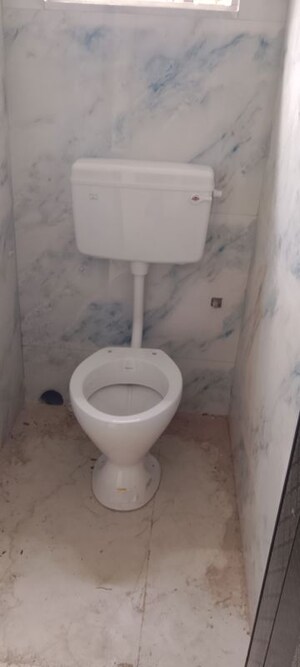 Bathroom in 2 BHK Apartment at Purba Sinthi – for Sale