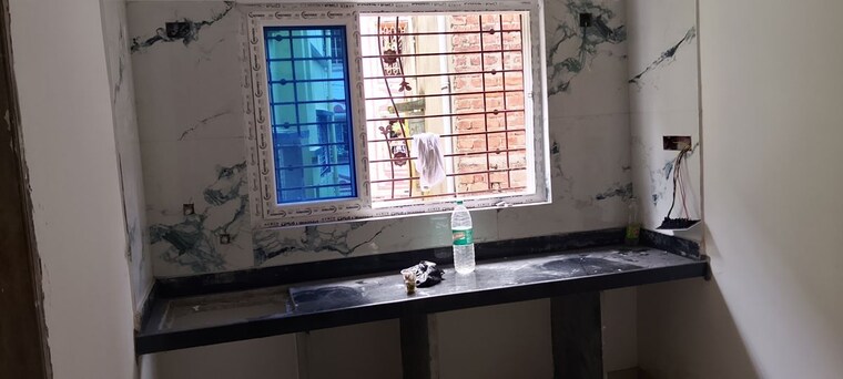 Kitchen, purba sinthi 2 Bedroom 700 Sq.Ft. Apartment In Purba Sinthi Kolkata 10666728
