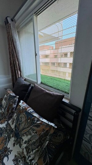 Living Room in 1 BHK Apartment at Sancheti Dreamcastle, Wakad – for Rent
