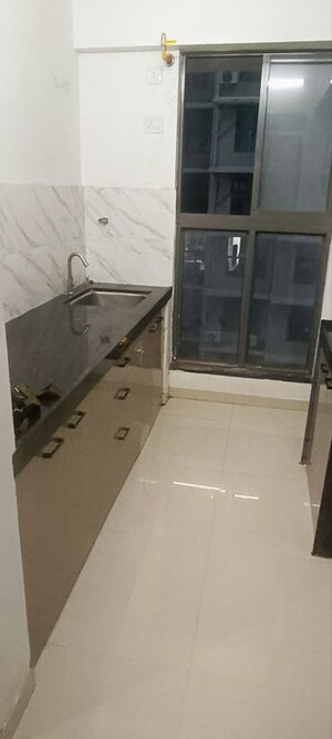 Kitchen in 1.5 BHK Apartment at Kalpataru Elitus, Mulund West – for Rent