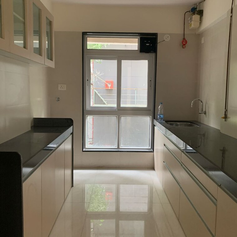 Kitchen, axiom-girdhar-apartment 2 Bedroom 668 Sq.Ft. Apartment In Kastur Park Mumbai 10667328