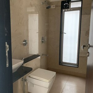 Bathroom in 2 BHK Apartment at Axiom Girdhar Apartment, Kastur Park – for Sale
