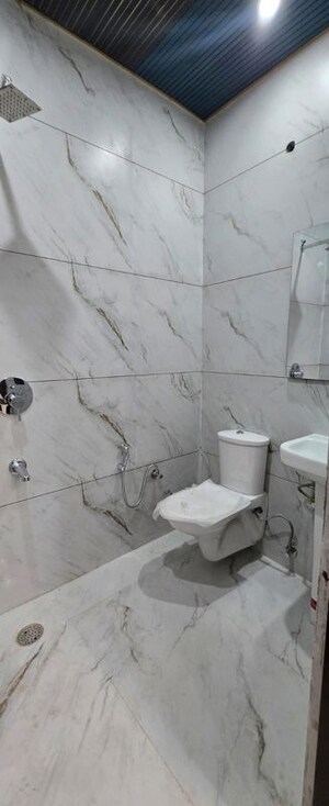 Bathroom in 3 BHK Builder Floor at Guru Nanak Enclave, Dhakoli – for Sale