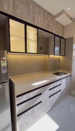 Kitchen in 2 BHK Apartment at Raunak Unnathi Woods Supreme, Ghodbunder Road – for Sale