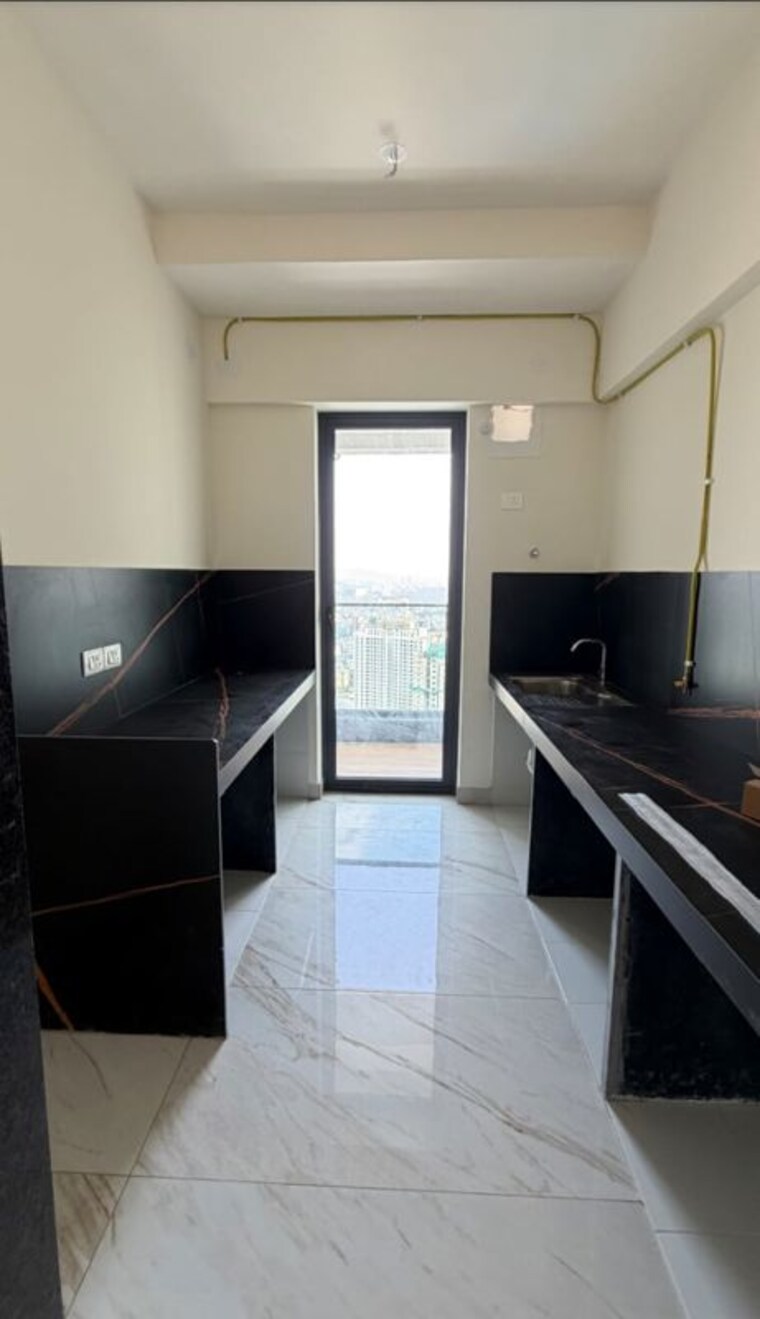 Kitchen, raymond-the-address 3 Bedroom 1093 Sq.Ft. Apartment In Pokhran Road No Two Thane 10667477