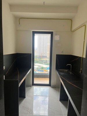 Kitchen in 3 BHK Apartment at Raymond The Address, Pokhran Road No Two – for Rent