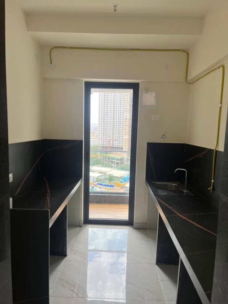 Kitchen, raymond-the-address 3 Bedroom 1120 Sq.Ft. Apartment In Pokhran Road No Two Thane 10667483