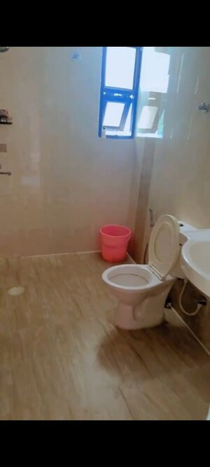 Bathroom in 2.5 BHK Apartment at Charms Castle, Raj Nagar Extension – for Rent