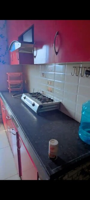 Kitchen in 2.5 BHK Apartment at Charms Castle, Raj Nagar Extension – for Rent