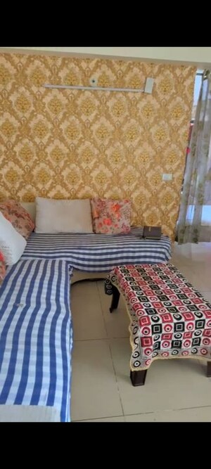 Living Room in 2.5 BHK Apartment at Charms Castle, Raj Nagar Extension – for Rent
