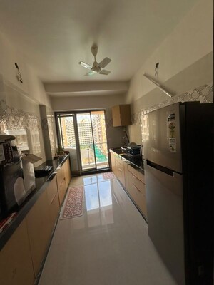 Kitchen in 2 BHK Apartment at Amar Devendra CHS, Borivali West – for Rent