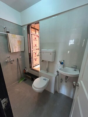 Bathroom in 2 BHK Apartment at Amar Devendra CHS, Borivali West – for Rent