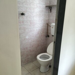 Bathroom in 2 BHK Apartment at Om Dwarkanath CHS, Nerul – for Rent