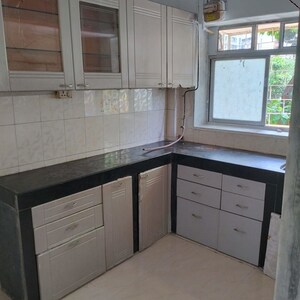 Kitchen in 2 BHK Apartment at Om Dwarkanath CHS, Nerul – for Rent