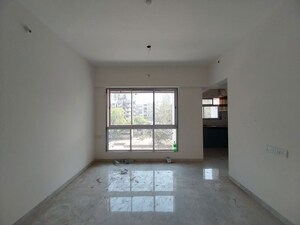 Room in 2 BHK Apartment at Sheth Auris Bliss, Malad West – for Rent