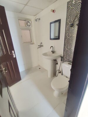 Bathroom in 3.5 BHK Apartment at Paramount Floraville, Sector 137 – for Rent