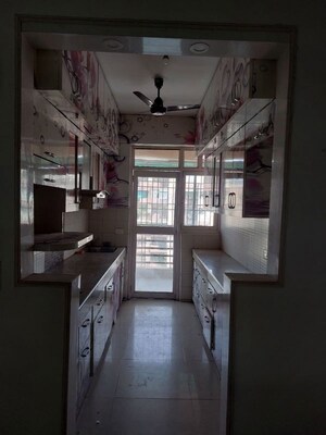 Kitchen in 2.5 BHK Apartment at Panchsheel Wellington, Dundahera – for Sale