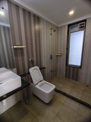 Bathroom in 1.5 BHK Apartment at Aspen Park, Goregaon East – for Rent