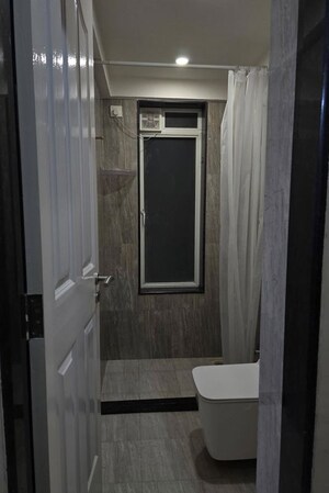 Bathroom in 1.5 BHK Apartment at Aspen Park, Goregaon East – for Rent