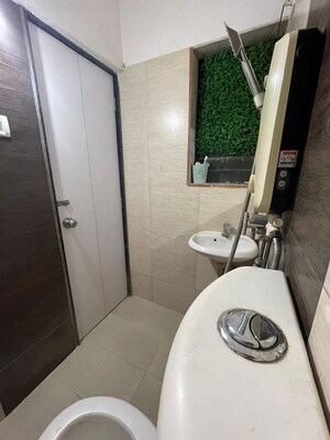 Bathroom in 1 BHK Apartment at Raunak Heights, Ghodbunder Road – for Sale