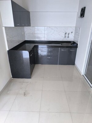 Kitchen in 2 BHK Apartment at Mantra Essence, Undri – for Sale