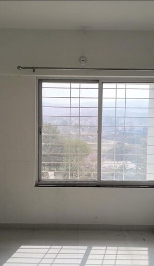 Room in 2 BHK Apartment at Mantra Essence, Undri – for Sale