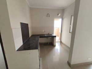 Kitchen in 2 BHK Apartment at Paramount Floraville, Sector 137 – for Sale