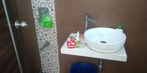 Bathroom in 3 BHK Apartment at Harmony Sky Suites, Ghodbunder Road – for Rent