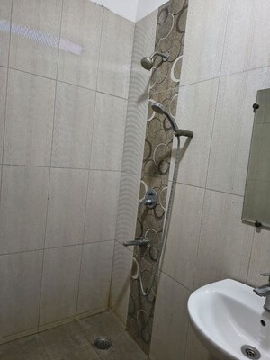 Bathroom in Studio Apartment at Wegmans Signature Tower, Knowledge Park 3 Greater Noida – for Rent