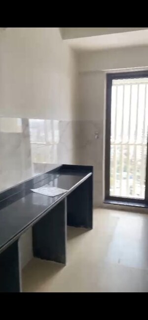 Kitchen in 2 BHK Apartment at Naman Habitat, Andheri West – for Rent