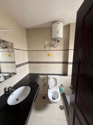 Bathroom in 3 BHK Apartment at Unitech Uniworld Gardens 2, Sector 47 – for Rent