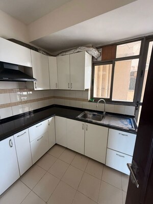 Kitchen in 3 BHK Apartment at Unitech Uniworld Gardens 2, Sector 47 – for Rent
