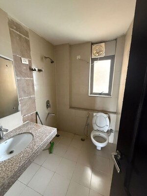Bathroom in 3 BHK Apartment at Unitech Uniworld Gardens 2, Sector 47 – for Rent