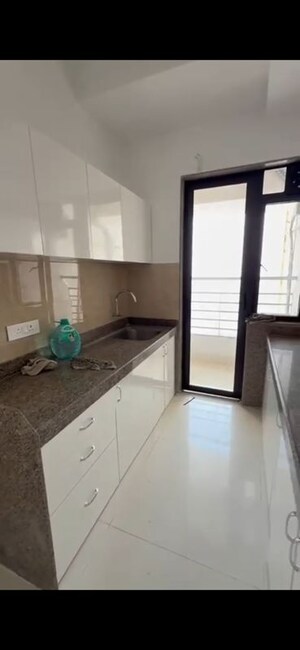 Kitchen in 3 BHK Apartment at Sunteck City Avenue 1, Goregaon West – for Rent