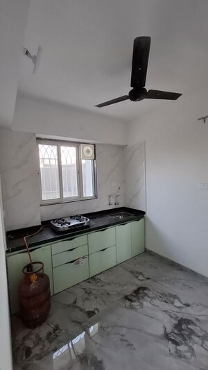 Kitchen in 1 BHK Apartment at Deepa CHS, Pashan – for Rent