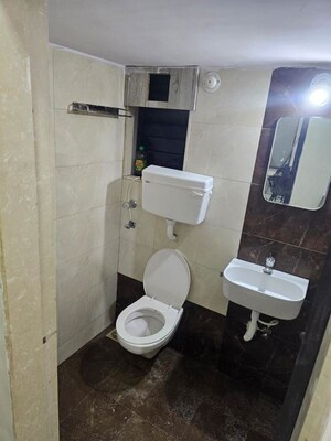 Bathroom in 2 BHK Apartment at Salangpur Salasar Aavatar, Mira Road – for Rent