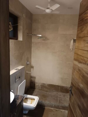 Bathroom in 2 BHK Apartment at Vasant Vihar – for Rent