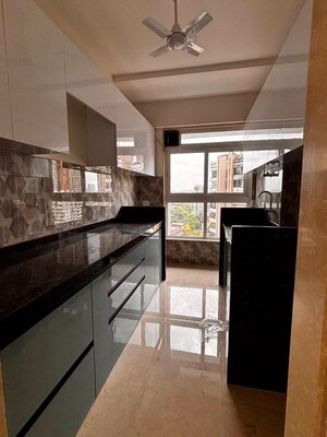 Kitchen in 1 BHK Apartment at Group Satellite Elegance, Goregaon East – for Rent