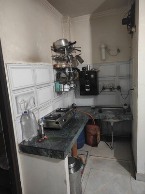 Kitchen in 1.5 BHK Builder Floor at Gharoli – for Sale