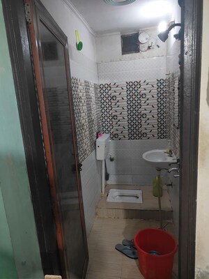 Bathroom in 1.5 BHK Builder Floor at Gharoli – for Sale