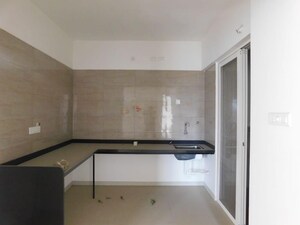 Kitchen in 2 BHK Apartment at Kolte Patil Little Earth, Kiwale – for Sale