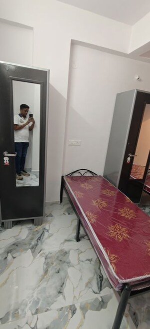Bedroom in  Pg at Shivaji Co Operative Housing Society – for Rent